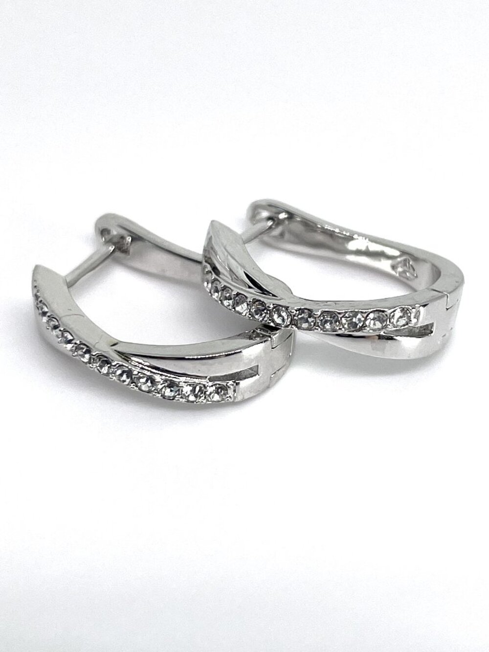 Criss Cross Rhodium Plated Huggie Earrings, made with Crystals by Swarovski